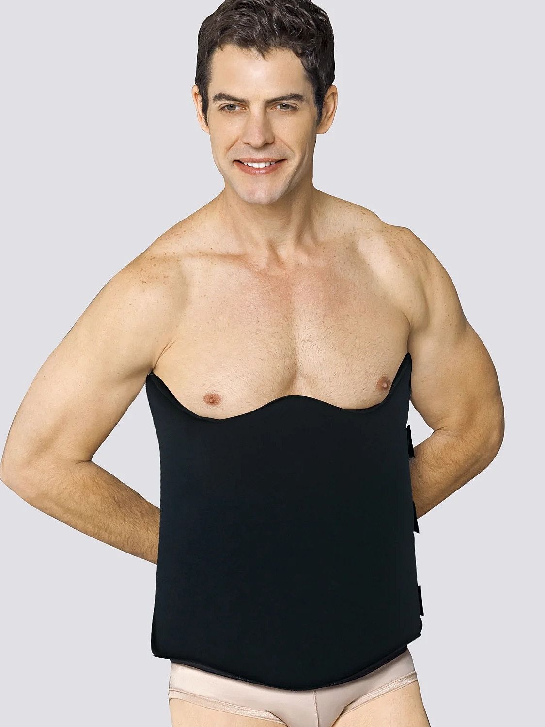 Model wearing a black shapewear top.