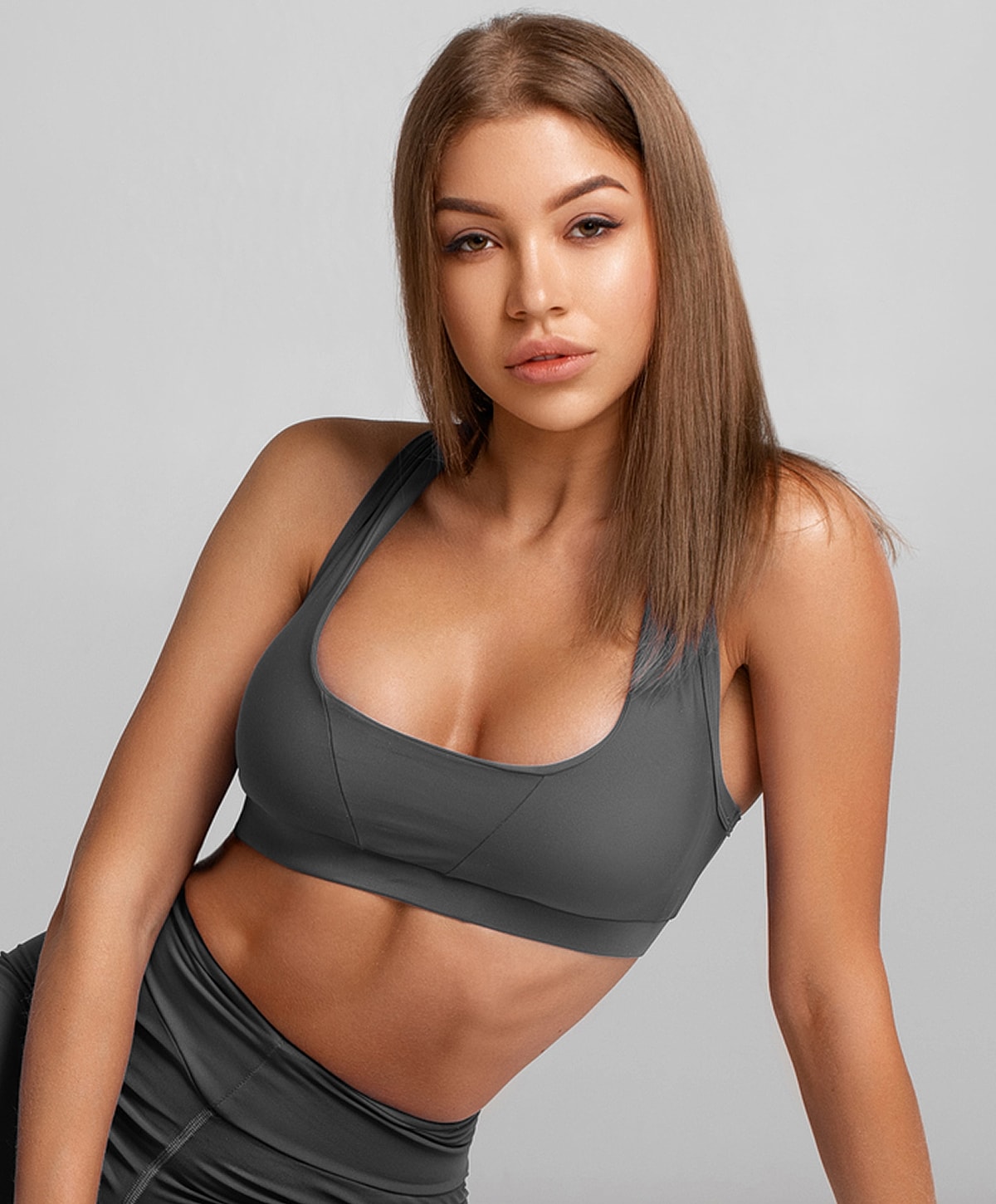 Model in stylish athletic wear posing confidently.