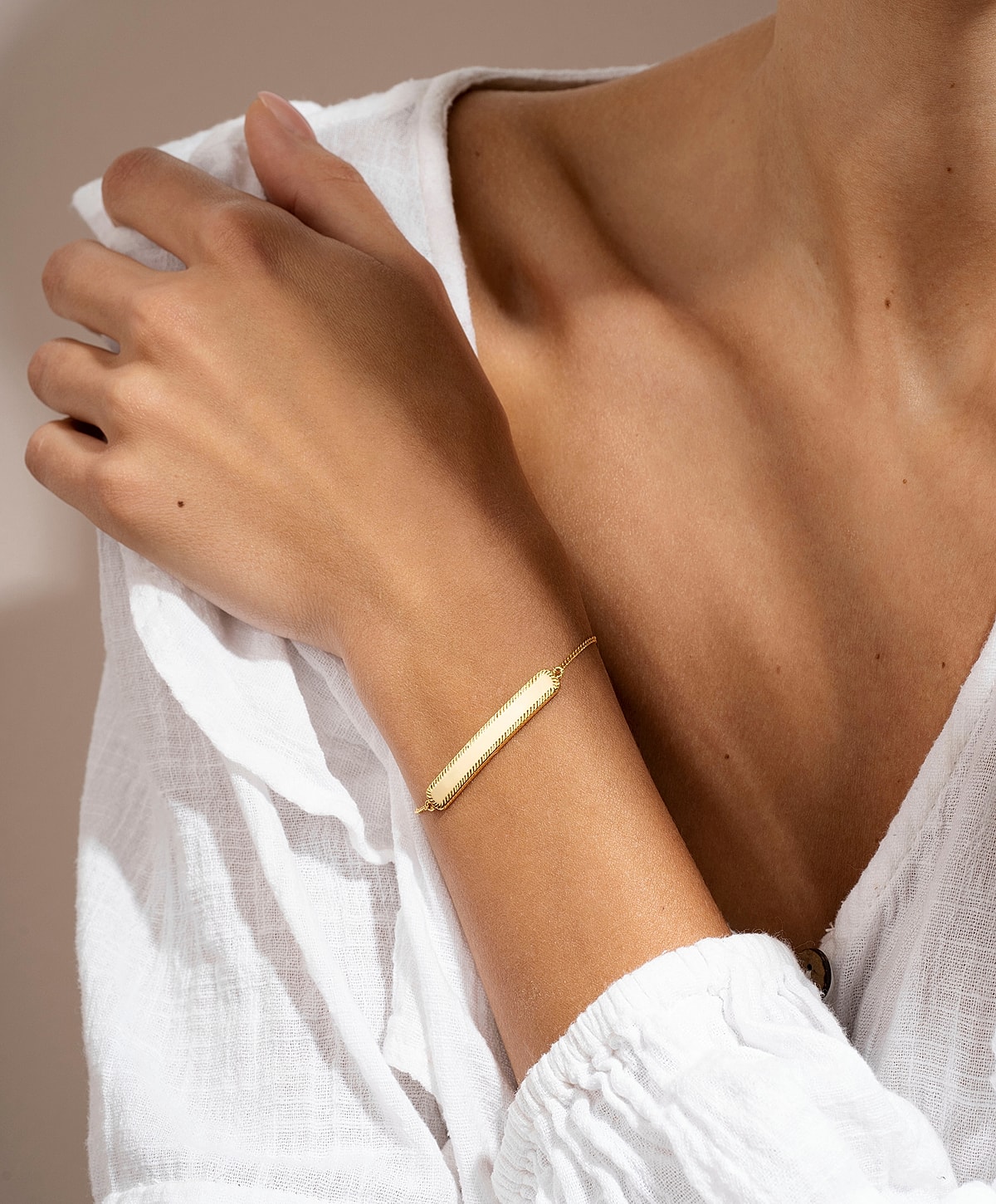 Woman in lace lingerie posing indoors.