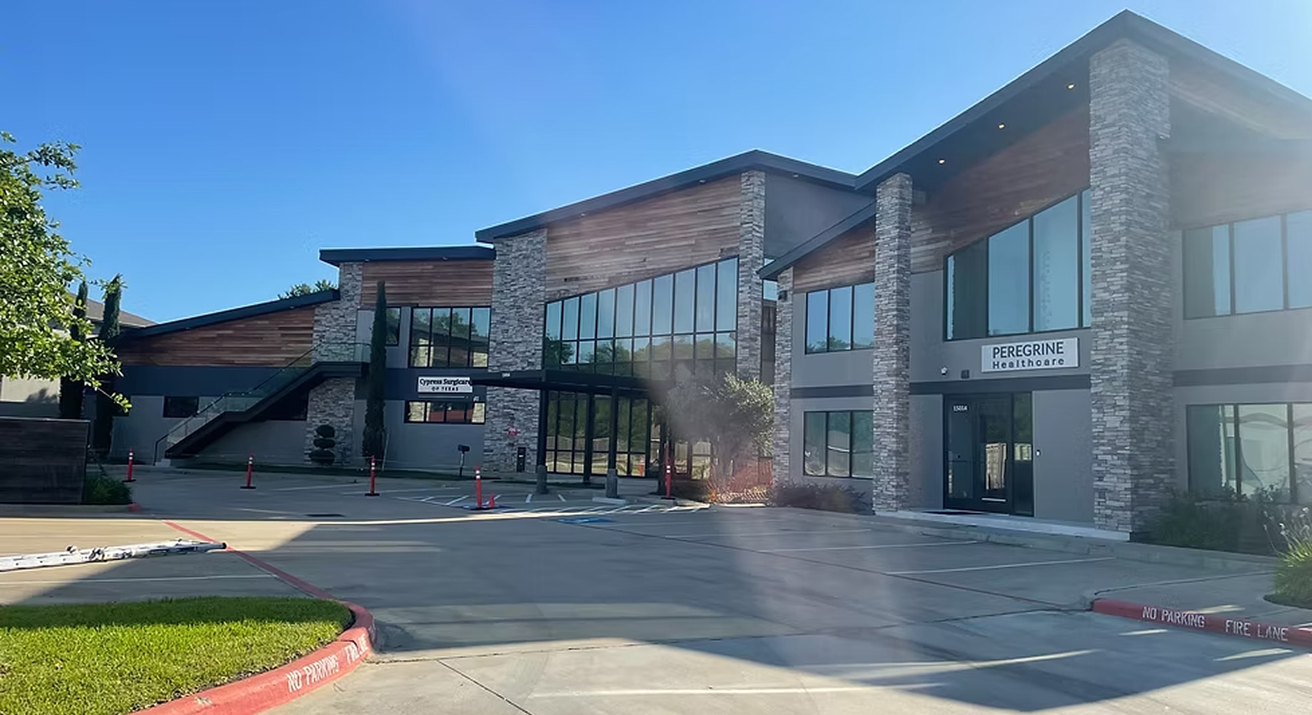 Modern healthcare building with large windows.